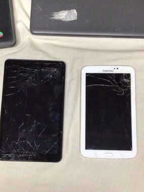 Samsung White Tablet with Visible Cracked Screen. Computer parts lot , parts lot